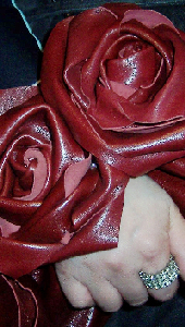 burgundy lamb skin rose clutch