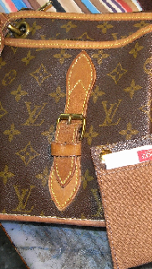 brown monogram canva clutch bag