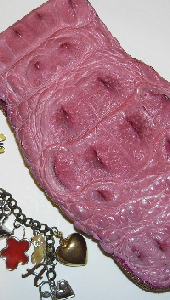 pink crocodile clutch bag