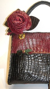 patched crocodile handbag